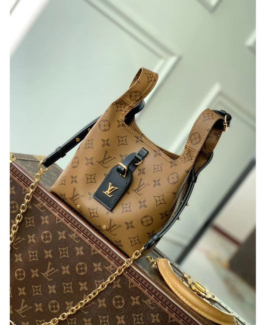 Louis Vuitton Atlantis BB in Tela Monogram Reverse